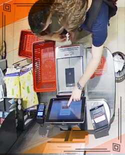 Customer using self-checkout monitored by SAI One